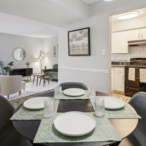 Spacious living areas to recline and recharge a dining room with a table and chairs